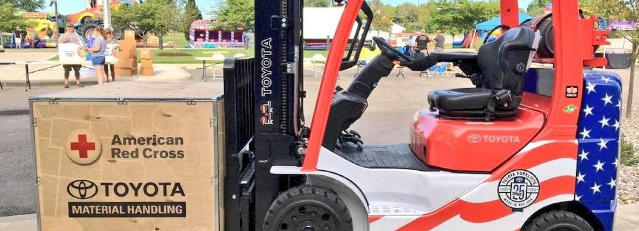 Toyota's Red Cross Fourth of July Forklift parked outside